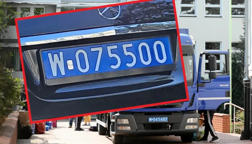 Niebieska tablica rejestracyjna z numerem W-075500 na samochodzie ciężarowym.